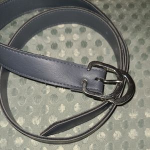 Belt. Color gray  Man made material.